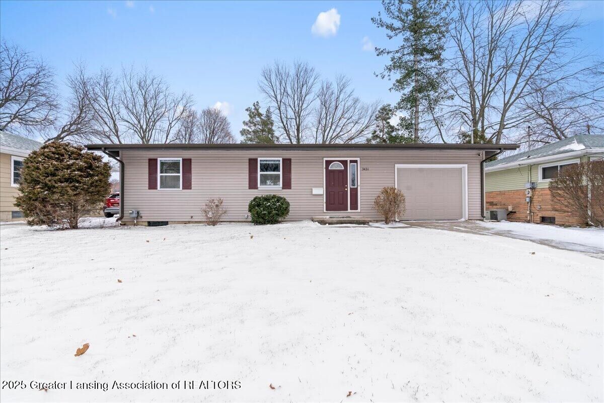 Property Photo:  3431 Palmer Street  MI 48910 