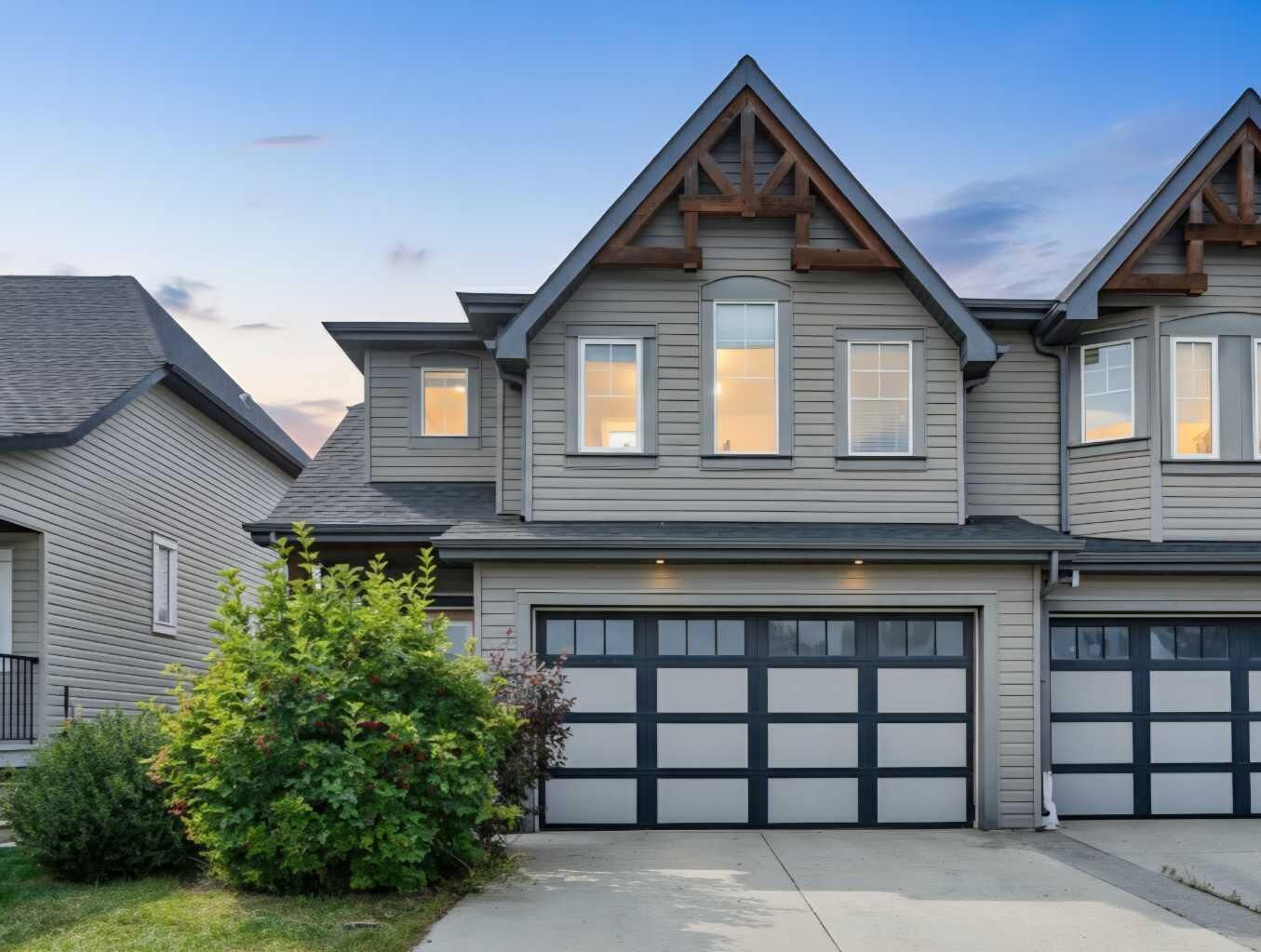 Property Photo: 157 Rainbow Falls Boulevard AB T1X 0N6