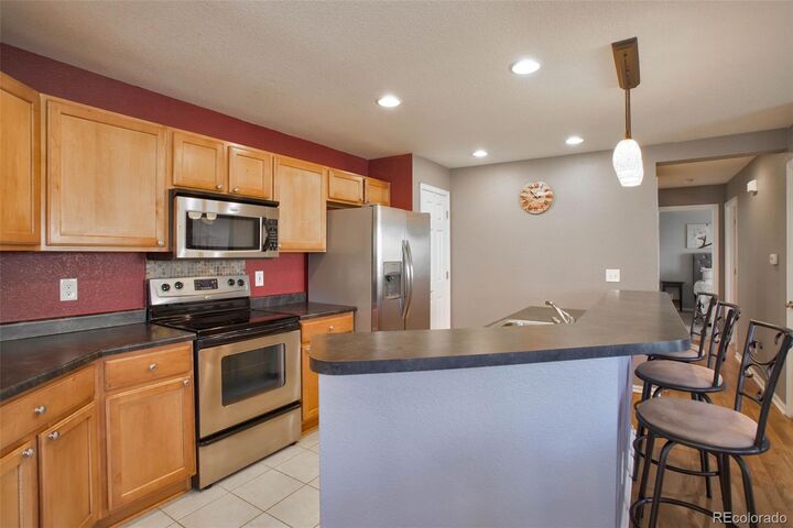 Property Photo:  11844 Oak Hill Way A  CO 80640 