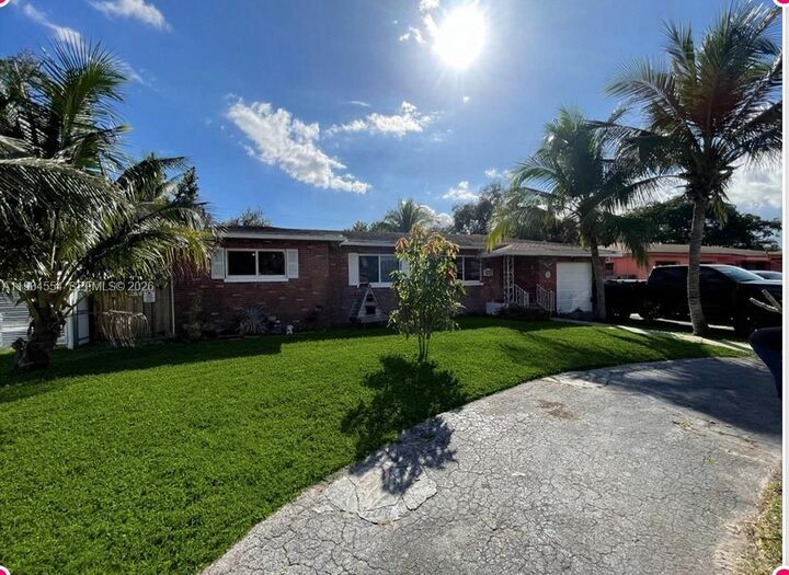 Property Photo:  630 NE 165th St  FL 33162 