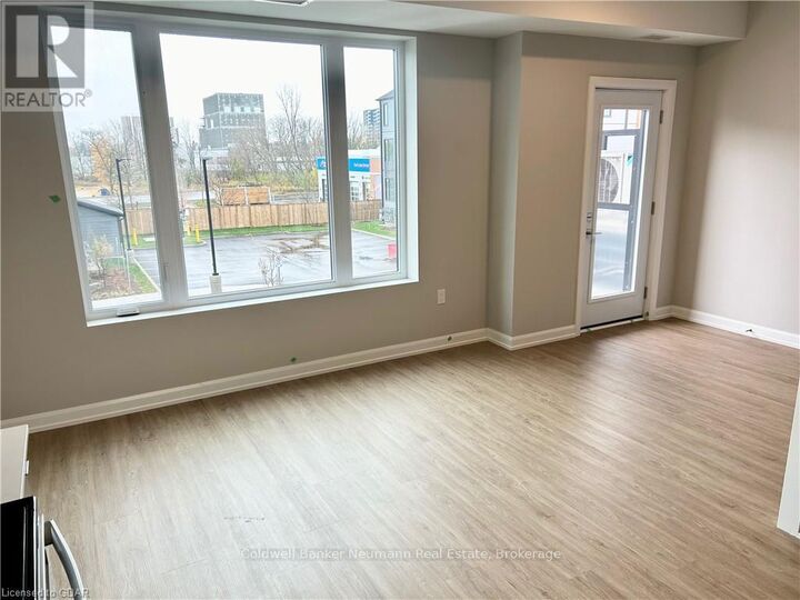 Property Photo:  708 Woolwich Street 406  ON N1H 7G6 