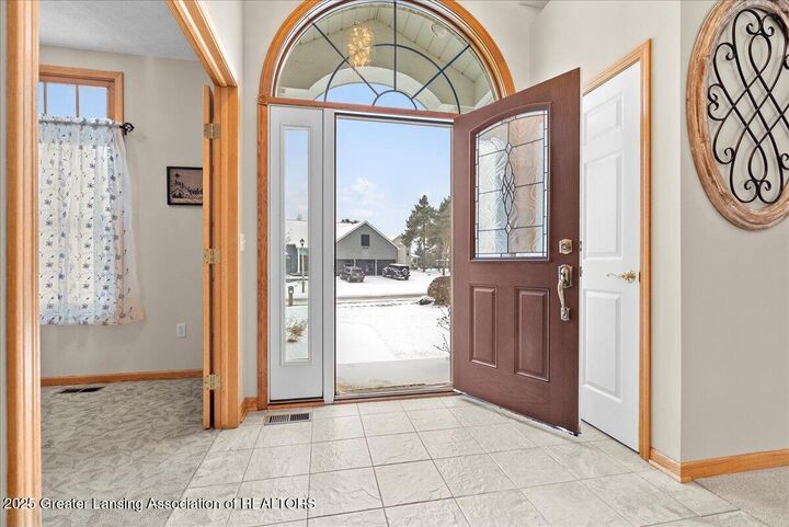 Property Photo:  2658 Sanibel Hollow  MI 48842 