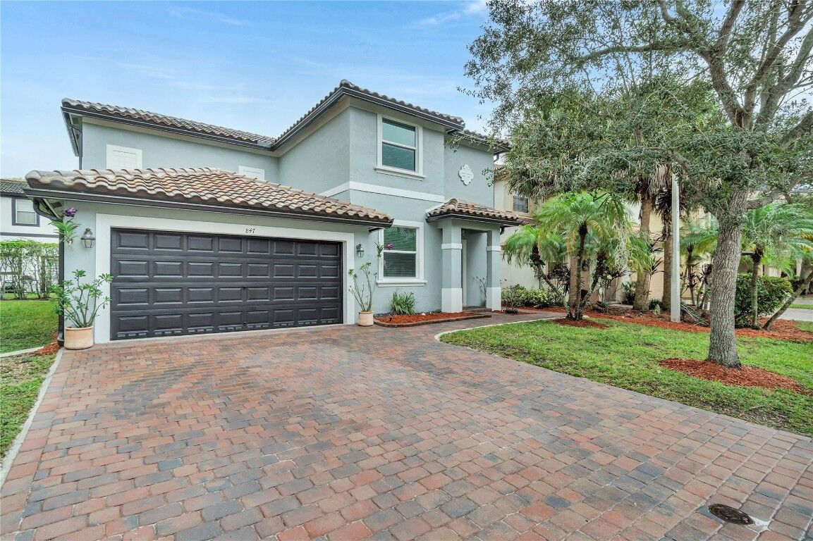 Property Photo:  847 NW 127th Avenue  FL 33071 