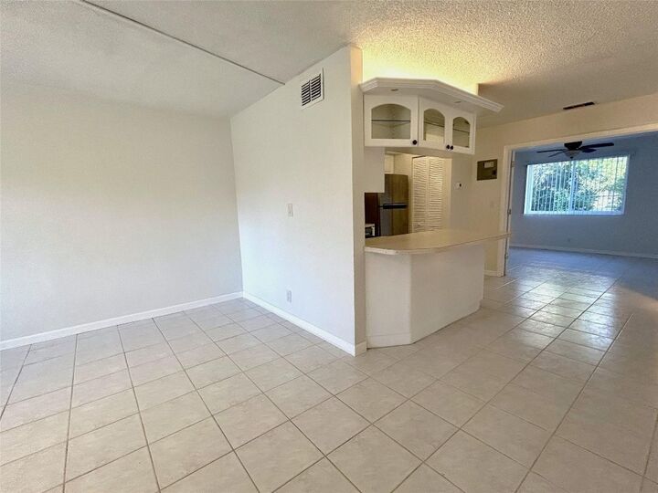 Property Photo:  2175 NE 56th Street 109  FL 33308 