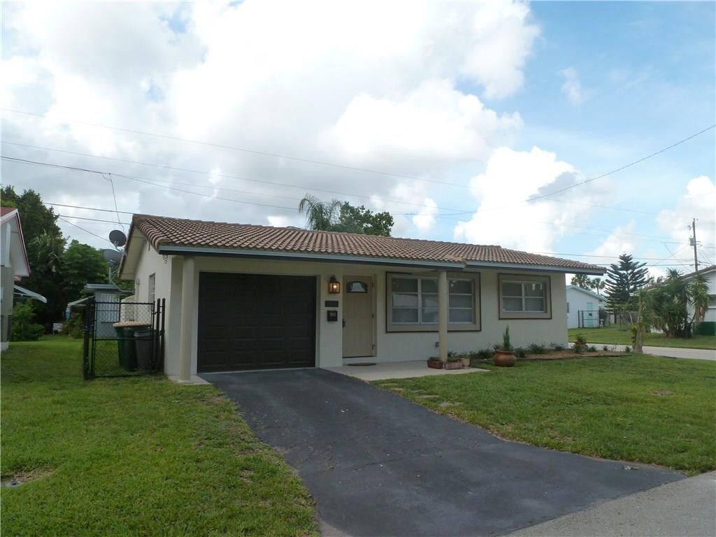 Property Photo:  2616 NW 55th Street  FL 33309 