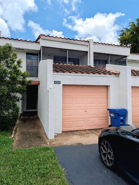 Property Photo:  6594 Racquet Club Drive 98  FL 33319 