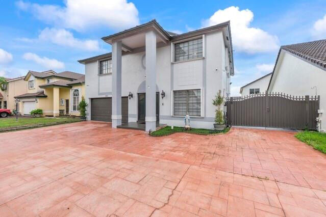 Property Photo:  18811 NW 80th Avenue  FL 33015 