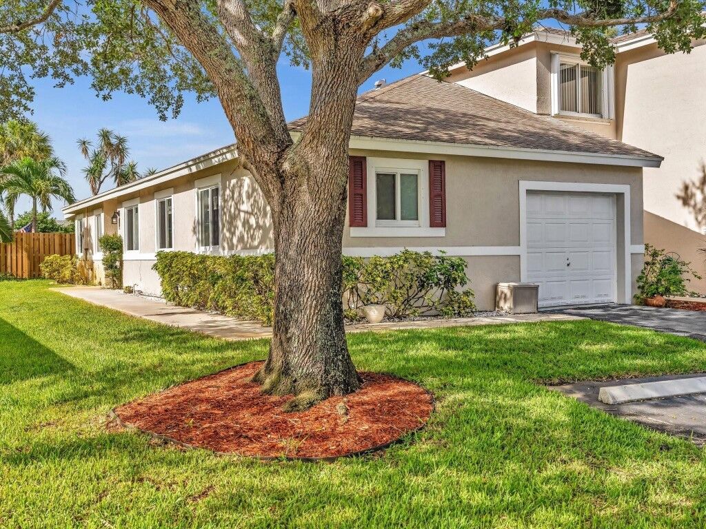 Property Photo:  860 NW 42nd Place 860  FL 33064 