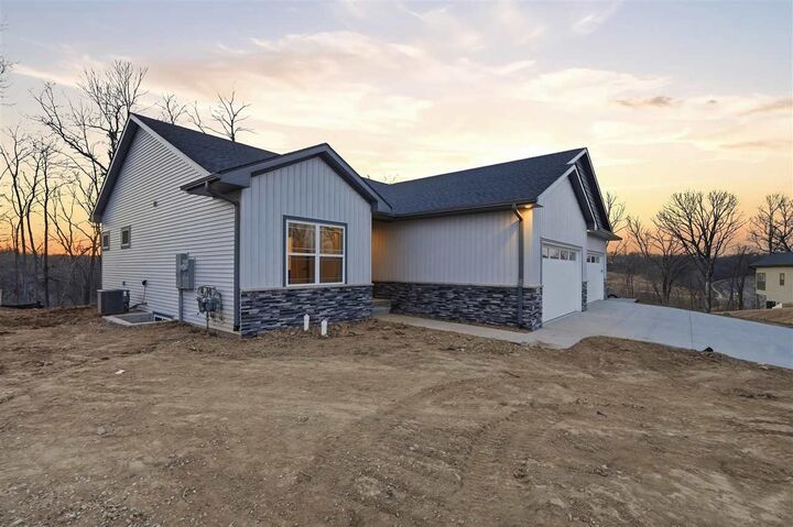 Property Photo: 675 Maclan Ct IA 52246