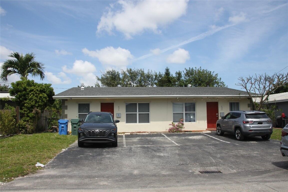 Property Photo:  631 NE 46th Court  FL 33334 
