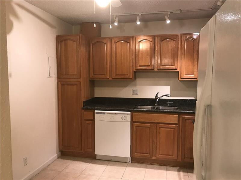 Property Photo:  22765 SW 66th Avenue 105  FL 33428 