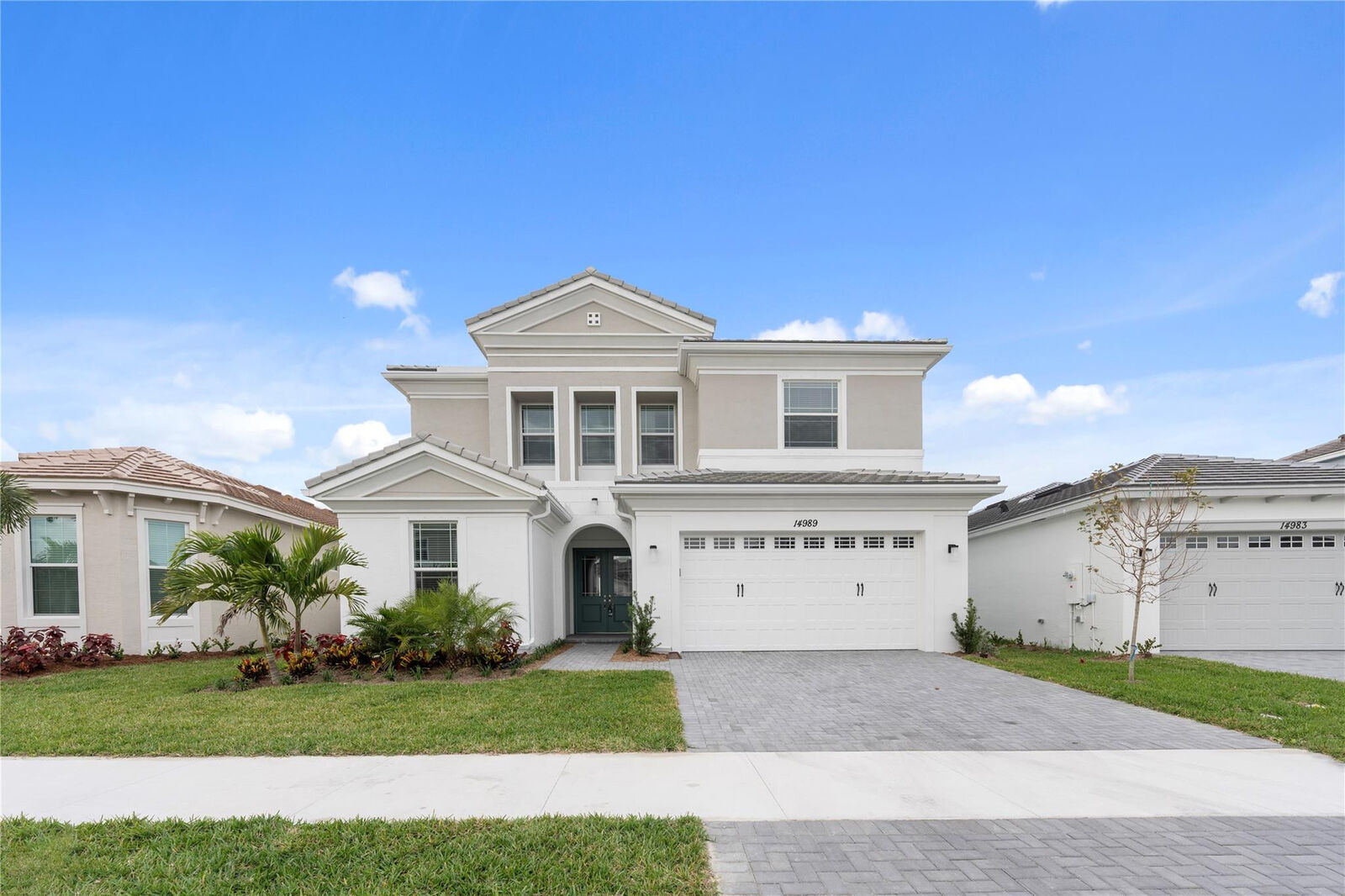 Property Photo: 14989 Redcove Place FL 33470