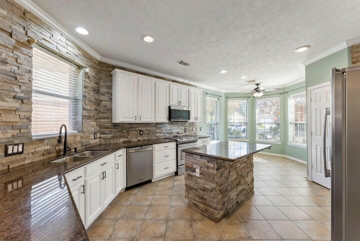 Property Photo:  11 S Bendrook Loop  TX 77384 