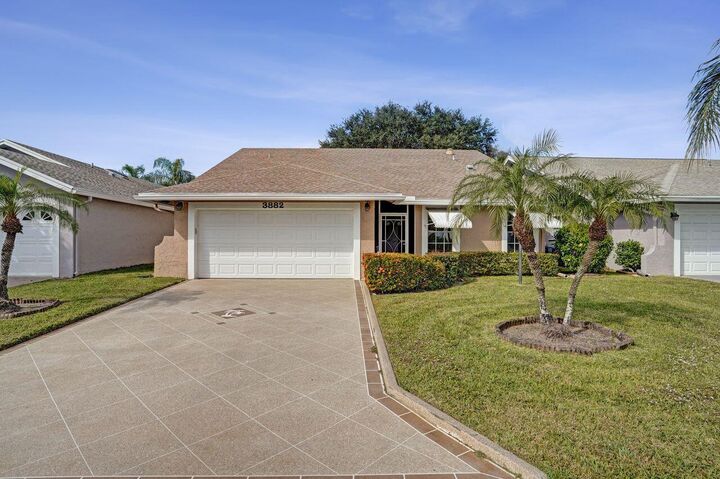 Property Photo:  3882 Dafilee Circle  FL 33417 