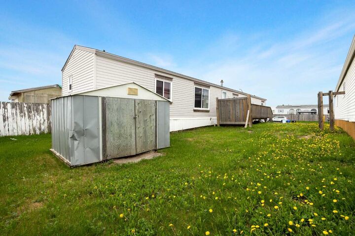 Property Photo:  104 Cree Road  AB T9K 1X3 