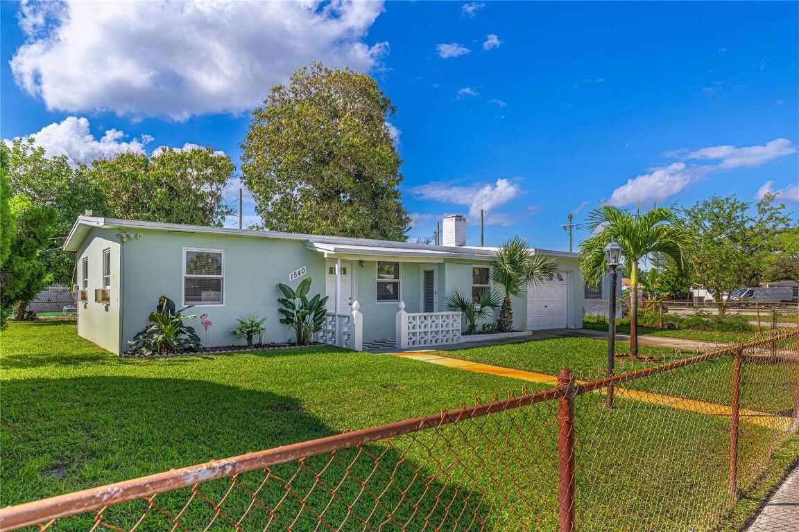 Property Photo: 1540 NE 48th Court FL 33064