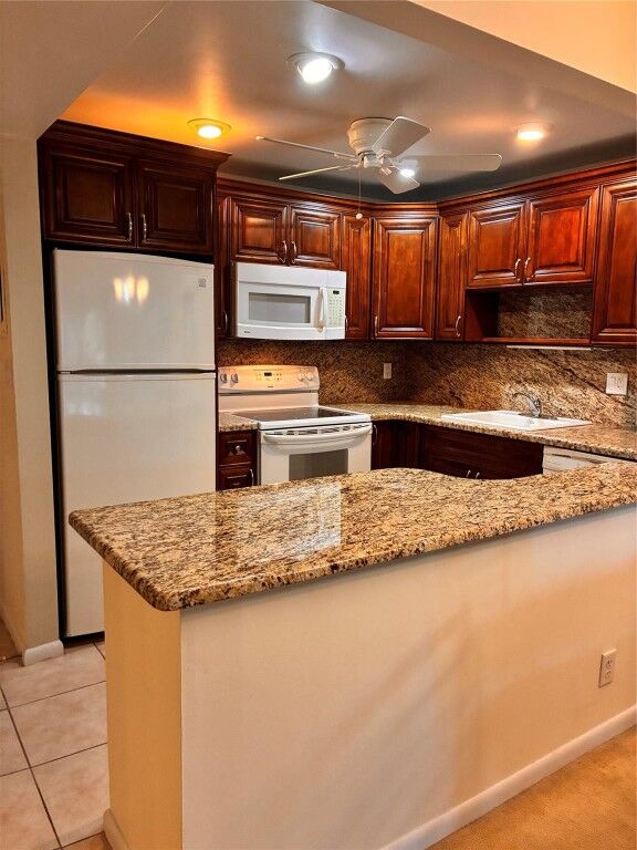 Property Photo: 255 S Cypress Road 329 FL 33060