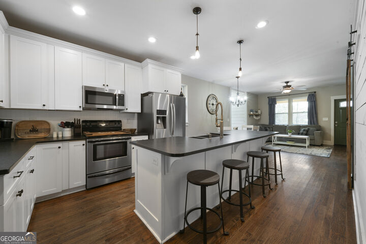 Property Photo:  1956 Blacks Bluff Road SW  GA 30161 