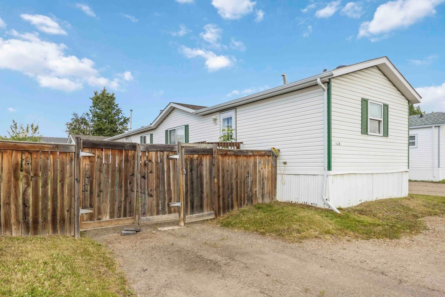 Property Photo:  128 Caouette Crescent  AB T9K 2H5 