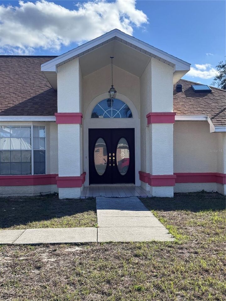 Property Photo:  10446 Baylor Drive  FL 34608 