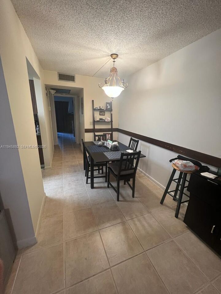 Property Photo:  1551 SW 135th Ter 107G  FL 33027 