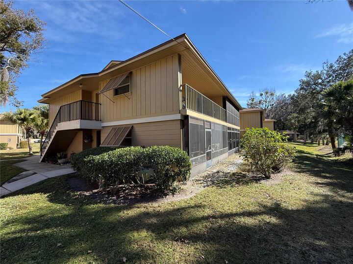 Property Photo:  130 Jasmine Woods Court 7B  FL 32725 