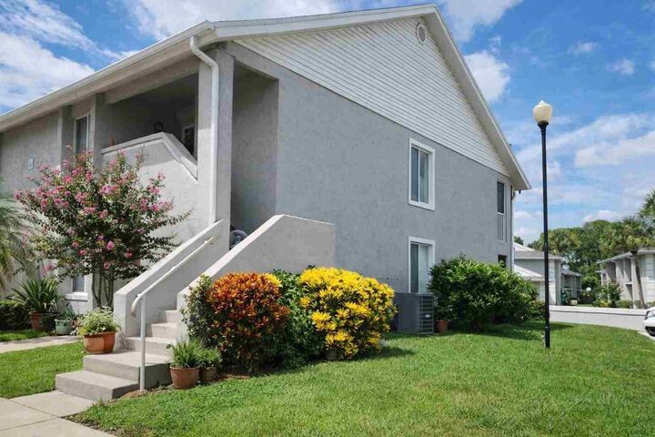 Property Photo:  5617 Blue Shadows Court 66-4  FL 32811 