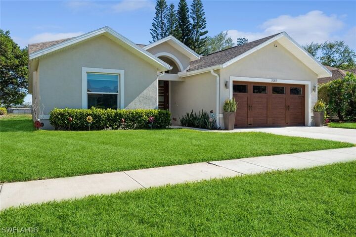 Property Photo: 7087 Lone Oak Boulevard FL 34109