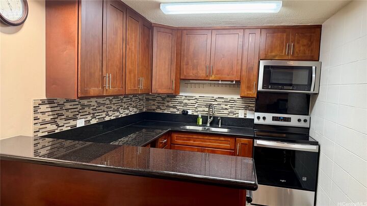 Property Photo:  94-99 Waipahu Street A308  HI 96797 