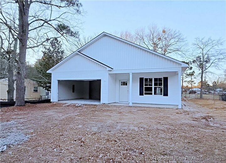 Property Photo:  1619 Minurva Drive  NC 28301 