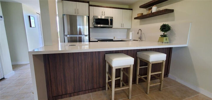 Property Photo:  5100 SW 90th Avenue 406  FL 33328 