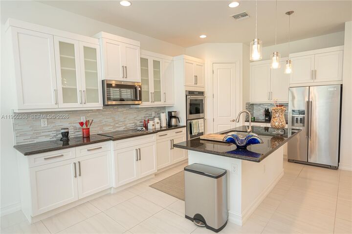 Property Photo:  11824 SW 13th Ct  FL 33025 