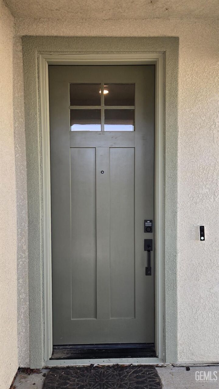 Property Photo:  9007 Miranda Garden Street  CA 93311 