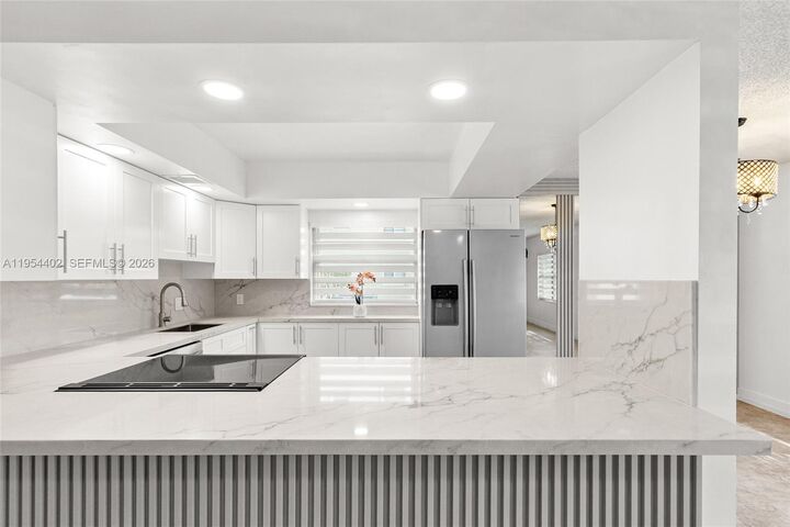 Property Photo:  850 SW 133rd Ter 118B  FL 33027 