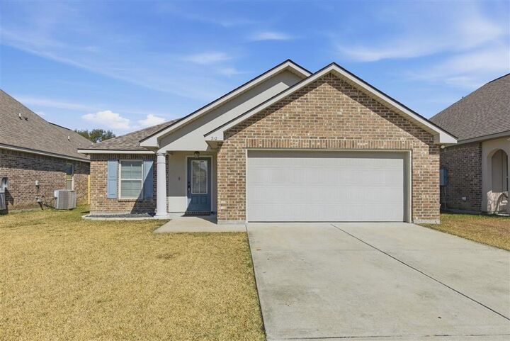 Property Photo:  212 Madison Crossing Drive  LA 70665 