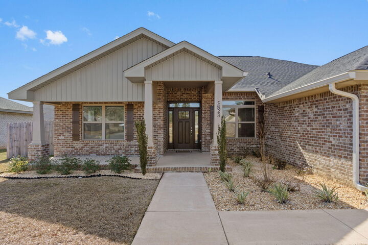 Property Photo:  5823 Crestlake Drive  FL 32536 