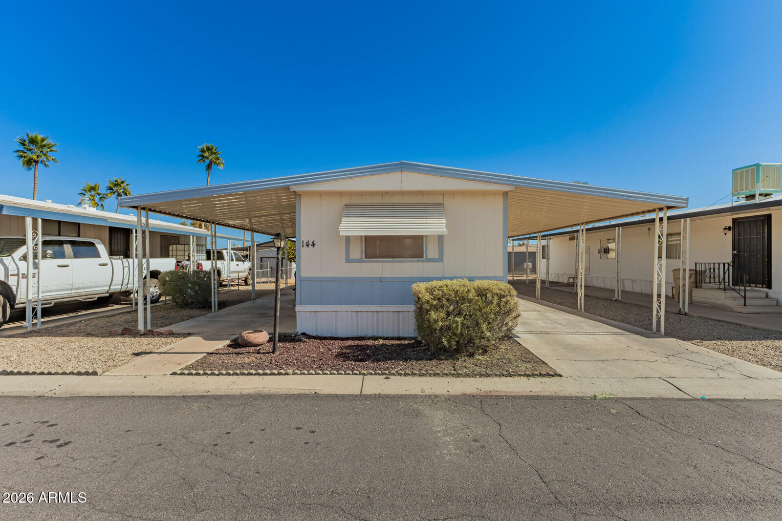 Property Photo:  10955 N 79th Avenue 144  AZ 85345 
