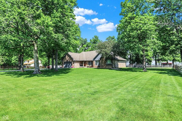 Property Photo:  10910 W US Highway 40  IN 46117 