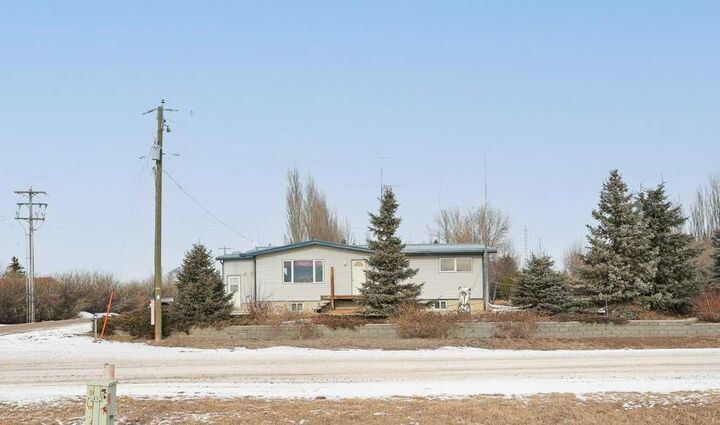Property Photo: 145006 Cassils Road 146 AB T1R 1B4