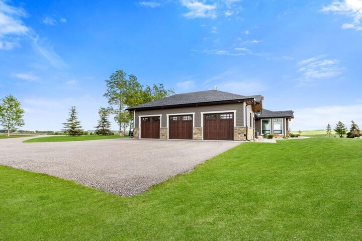 Property Photo:  285065 Symons Valley Road  AB T0M 1L0 