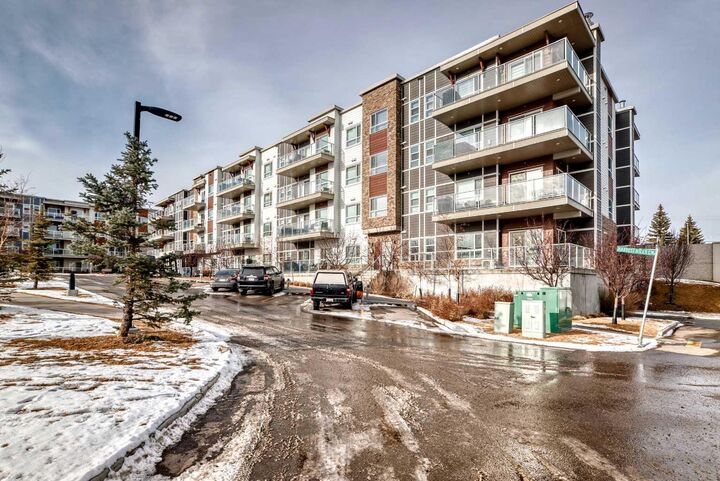 Property Photo:  360 Harvest Hills Common NE 104  AB T3K 2N1 