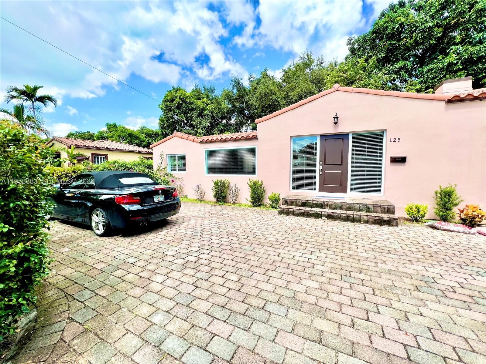 Property Photo: 125 NW 100th St FL 33150