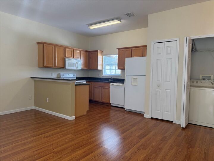 Property Photo:  823 Oak Shadows Road B  FL 34747 