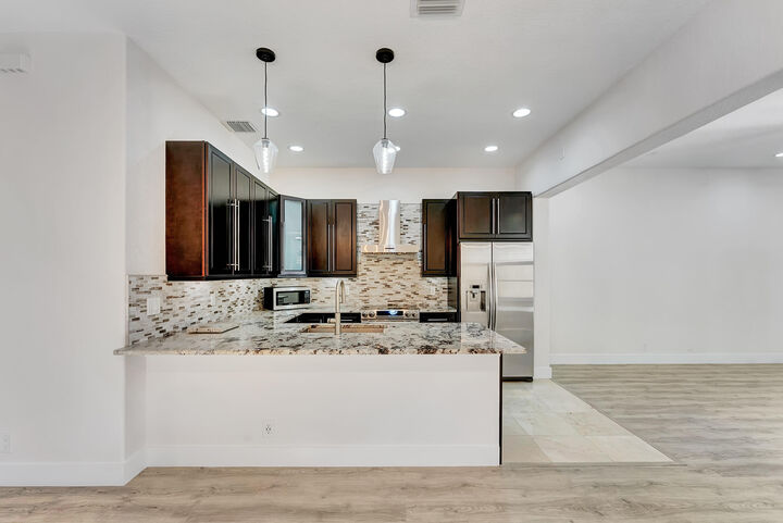 Property Photo: 406 NW 25th Avenue FL 33426