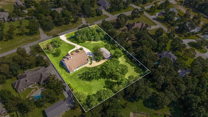 Property Photo: 8989 Stone Oak Drive TX 77316