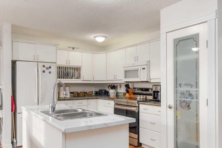 Property Photo:  202 Bird Crescent  AB T9H 4T3 