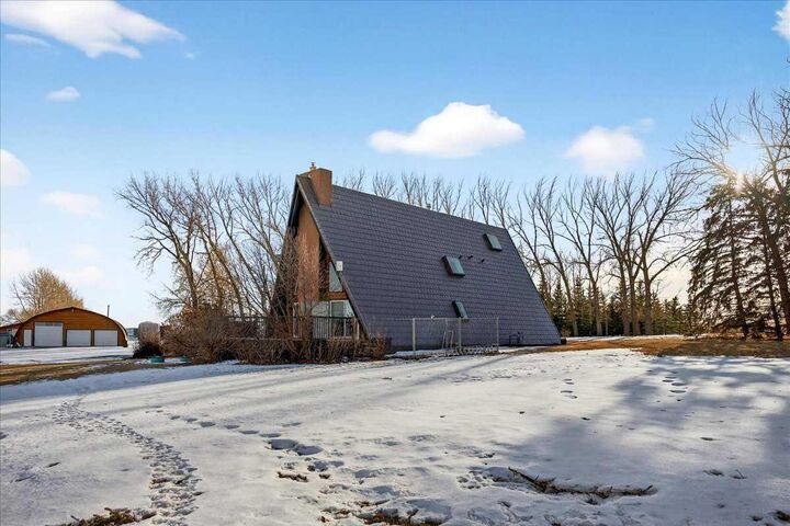 Property Photo: 241037 Rge Rd 241 AB T1P 2C3