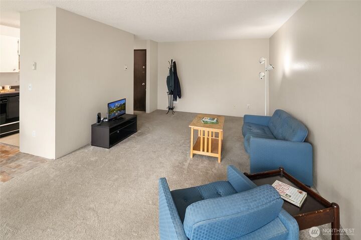 Property Photo:  15156  65th Avenue S 1007  WA 98188 
