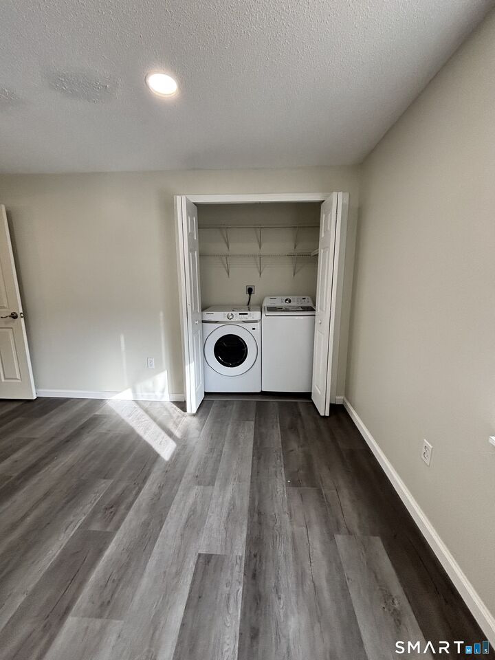 Property Photo:  11 King Arthur Drive 1B  CT 06357 