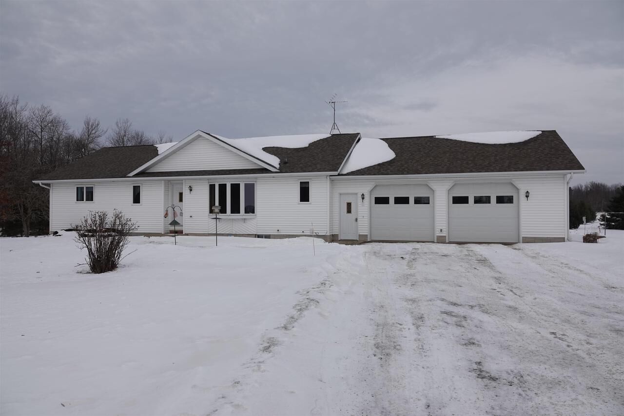 Property Photo:  W7188 Cedar Street  WI 54451 